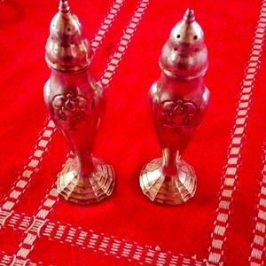 Sterling silver salt and pepper shakers from from late 18 00s 1881